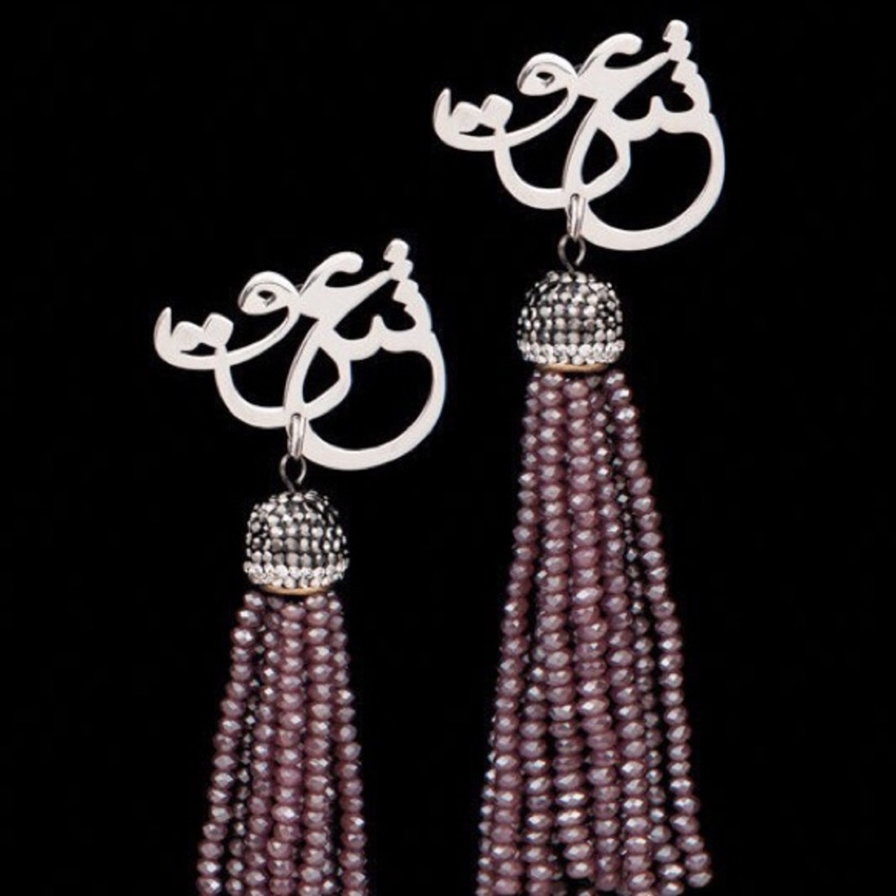 Fully Hand saw , hand made “love” earrings.